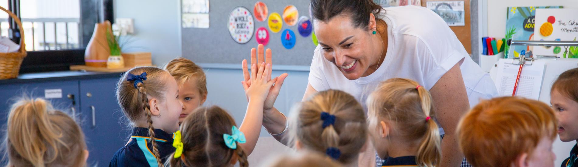 Teacher engaging with students